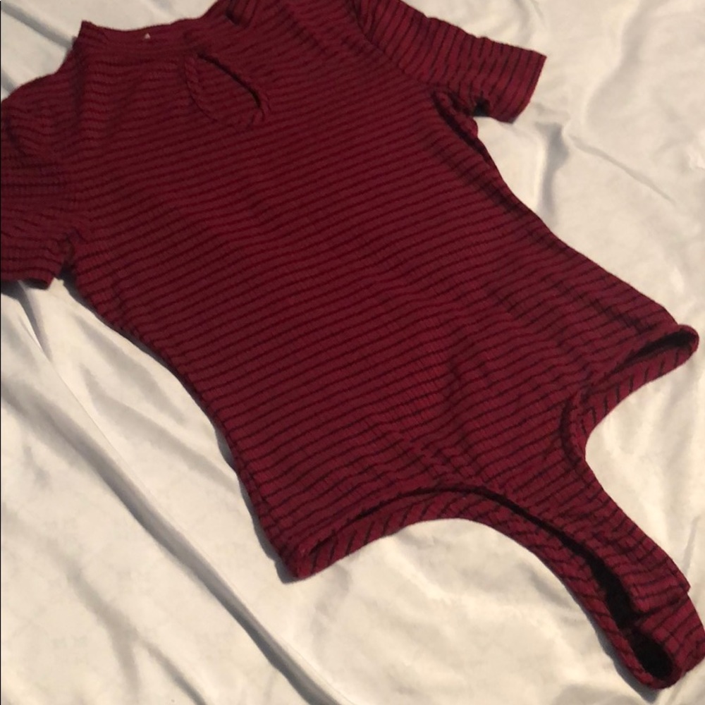 Burgundy bodysuit with black horizontal stripes